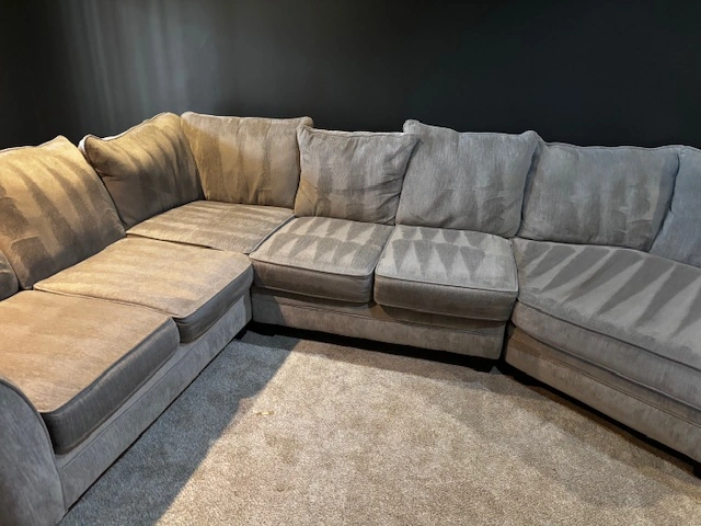 Freshly cleaned sectional sofa in a Birmingham home — LocalPro upholstery work